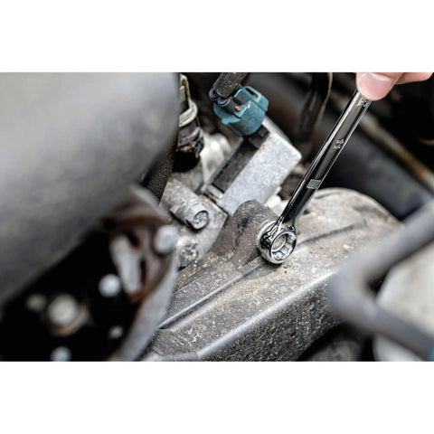 Using Beast Pro Mechanics Tool Set With Quarter Inch, Three-Eighths Inch, And Half Inch Drives on engine in a tight space.