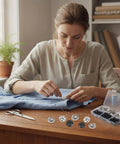 Woman using Must-Have Snap Button Kit For Fabric Sewing With 140 Pairs In Black And Silver All In One Variety Pack for a DIY project.