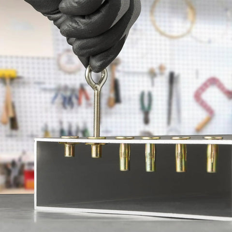 No Nonsense Top Shelf Multi Grip Rivet Nut Installation Tool Kit Featuring Pre Bulbed Shank And Stainless Steel Thread Inserts With Assorted Nuts Step Drill And Hex Wrench For Shop Work using a rivet nut in a workshop setting.