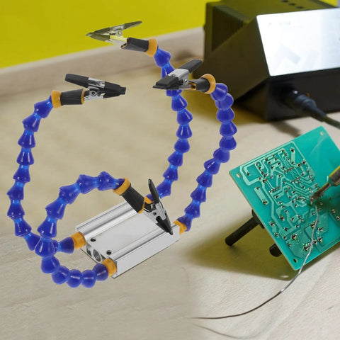 Four Arm Welding Station Helping Hands Soldering Stand With Base for PCB Repair featuring adjustable flexible arms in use.