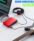 Red Two Channel USB Audio Interface For PC And Mac with 32Bit 192kHz Recording, guitar, and headphones connected