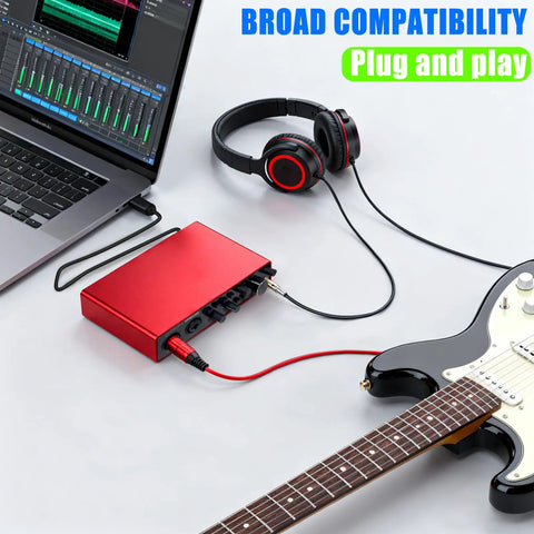 Red Two Channel USB Audio Interface For PC And Mac with 32Bit 192kHz Recording, guitar, and headphones connected