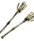Golden Skeleton Hands For Halloween Yard Decor 2 Pack Realistic Outdoor Skeleton Hands Stakes 12.6 By 2.8 Inch shown against white background.