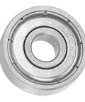 Close-up of a stainless steel roller ball bearing 6x19x6mm, part of a set of 10, for skateboards, inline skates, and electric skateboards.
