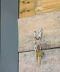 Robe Hook Satin Nickel Set Of 5, Heavy Duty Zinc Alloy Wall Hanger holding keys on wooden wall.