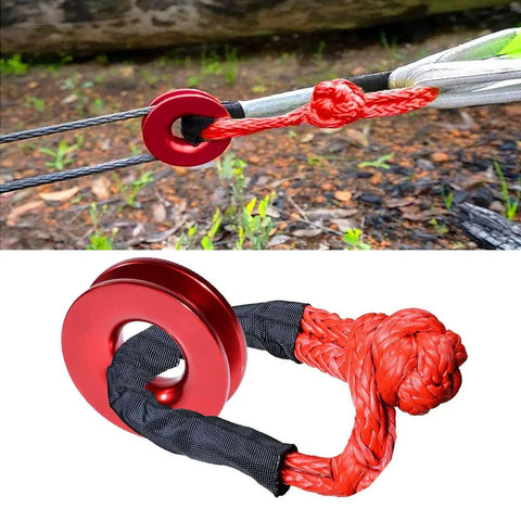 Ultra Tough 41000 Pound Recovery Ring Crafted From Aircraft Grade Aluminum with red synthetic shackle setup on off-road cable