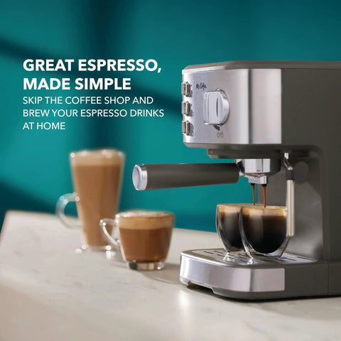 Compact Espresso Machine With 15 Bar Pump And Steam Wand Milk Frother Automatic Coffee Maker brewing espresso into cups.