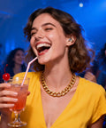 Woman at a concert wearing Concert Ear Plugs With High Fidelity Sound Filters 2 Pack For Live Music Raves Work And Musicians NRR 20 To 25 dB
