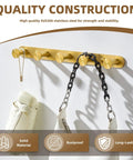 Five Hook Towel Rack In Brushed Dark Gold Stainless Steel with various items hanging, wall mount design.