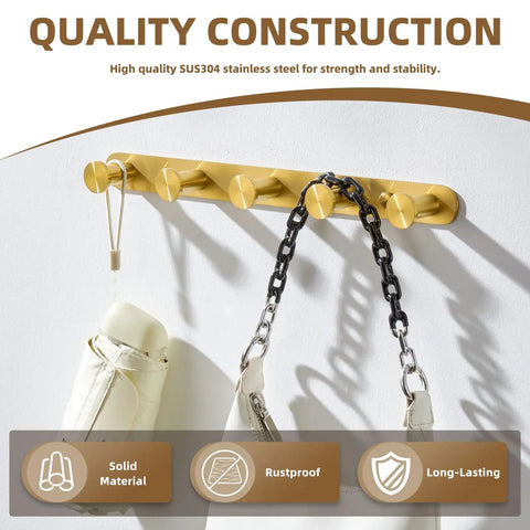 Five Hook Towel Rack In Brushed Dark Gold Stainless Steel with various items hanging, wall mount design.