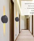 Jeanoko Contemporary Aluminum Wall Light Sconce 6W LED Lamp for Dining mounted on wall, illuminating corridor with warm light.