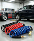 Top Shelf Recoil Air Compressor Hose Featuring Heavy Duty Pu Spring Design in red, blue, and black coiled for organized garage use.