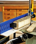 AccuRight Log Mill Sled System squaring a round log into flat lumber using a bandsaw, showcasing pro-grade woodworking tool.
