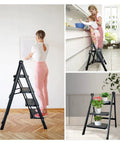 Woman using 3 Step Folding Ladder Step Stool With Wide Anti Slip Pedal Portable Sturdy Steel Frame Built To Last 200 Lbs Capacity