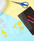 Must Have Die Cutting Magnetic Shim Mat Set 6x9 Inch with card size grids, two acrylic cutting plates next to dies and scissors.