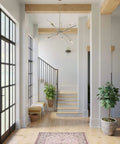 Adagio Collection 2 Light Black Modern Wall Light with Geometric Interlocking Elements in a bright hallway near staircase