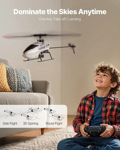 Child with remote controls Easy Start RC Helicopter For Beginners With Gyro 2.4GHz Remote OneKey Takeoff And Landing indoors.