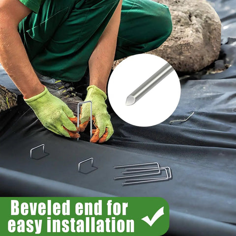 Person installing Bulk 500 Pack 6 Inch Galvanized Landscape Staples Garden Stakes Pro Grade Heavy Duty Anti Rust Ground Pins