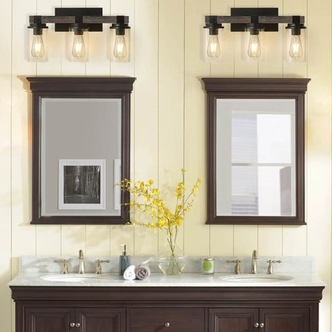 Rustic Farmhouse Vanity Light Fixture Over Mirror Three Light Industrial Matte Black Wall Sconces With Wood Accents And Clear Glass Shades For A Cozy Bathroom Bedroom Hallway Or Kitchen above dual mirrors and sink.