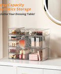 Clear Stackable Drawer Set 12 Pack In 3 Sizes Modular Acrylic Organizer on vanity with makeup items inside.
