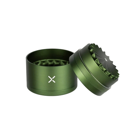 Toothless Herb And Spice Grinder With Extra Storage For Everyday Kitchen Bosses Aircraft Grade Aluminum Manual Grinder Two And A Half Inch Matte Green Finish Smooth Jam Free Grind image featuring open matte green segments.