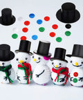 Awesome Christmas Craft Button Kit With 700 Pieces Includes 50 Mini Black Top Hats 50 Carrot Noses 100 Wiggle Eyes And 500 Mix Color Resin Buttons For DIY Sewing And Holiday Decor Projects display with snowman figures, hats, noses, and buttons.