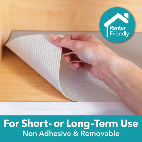 Hand applying Non Adhesive Non Slip Shelf Liner For Cabinets And Drawers, Gray Marble Pattern, 12 Inch Wide By 10 Feet Long Per Roll