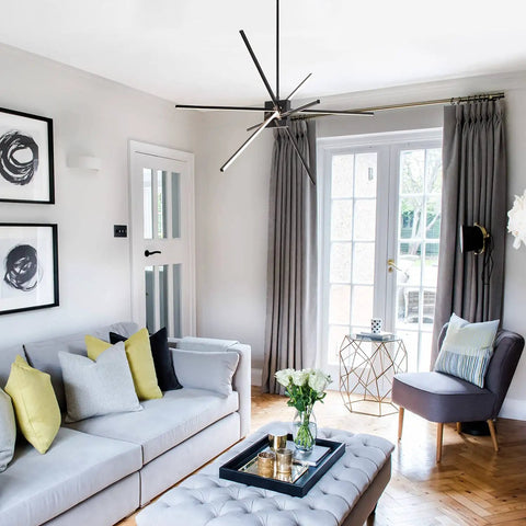 Totally Lit Modern Black LED Chandelier Pendant Light With 8 Light Fixtures installed in bright living room setting