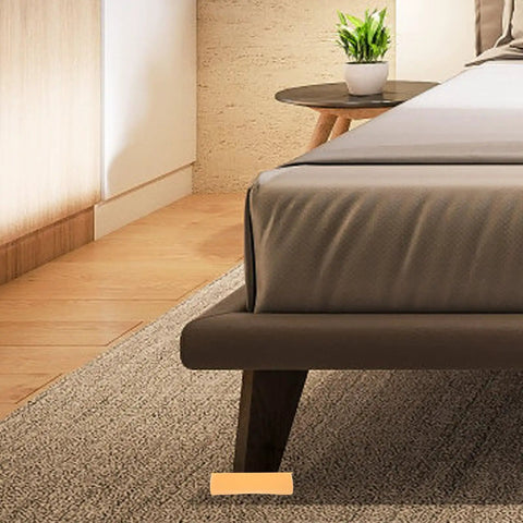 Four Pack Silicone Furniture Stoppers With Antislip Design Easy To Install Rubber Feet For Bed Legs on hardwood floor