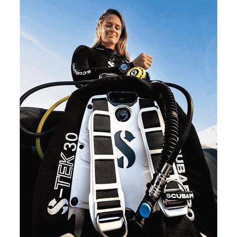 Diver preparing with Donut Wing For Technical Scuba Diving With 30 Lb Lift, Includes Inflator Hose And K-Style BPI, black.