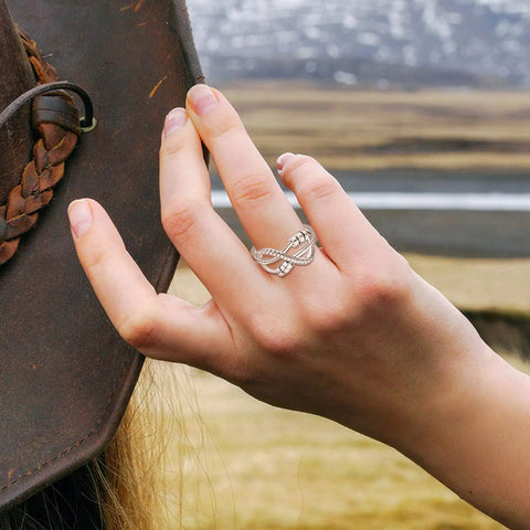 Hand wearing Knot Fidget Ring With Bead Spinning For Stress Relief And Focus Adjustable Gold Tone Ring For Women Calm Anxiety ADHD