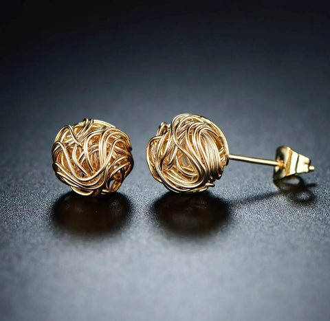 18K Gold Plated Woven Love Knot Stud Earrings For Women, 10mm, Made In Brazil, Dainty Yet Bold Gold Tone Jewelry For Everyday Glam, Hypoallergenic Earring Set. Side view of 18K gold plated woven love knot stud earrings, 10mm