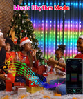 People celebrating with Programmable Colorful Smart LED Window Curtain Lights With APP Control IP65 Waterproof 400 RGB LEDs DIY Text And Pattern Fairy Lights For Proposals And Weddings Backdrops Parties Christmas Home Decor Vibe Ready, in music rhythm mode.