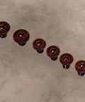 Premium Red Replacement Scale And Pivot Torx Screws For Spyderco Manix 2 G10 Manix 2 XL Set Of 6 showing six red screws in a row.