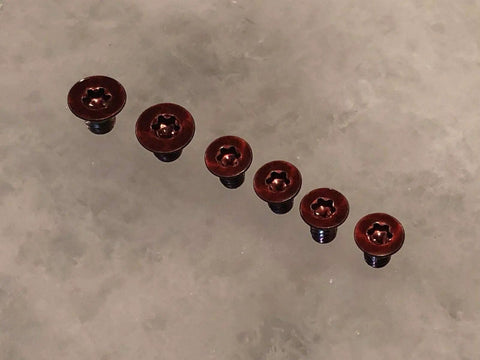Premium Red Replacement Scale And Pivot Torx Screws For Spyderco Manix 2 G10 Manix 2 XL Set Of 6 showing six red screws in a row.