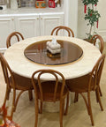 Kick Back Heavy Duty Tempered Glass Lazy Susan Turntable 31 To 35 Inch Round on marble dining table with wooden chairs.