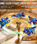Upgraded ABS Fighter Jet RC Plane for kids performing circular flight with LED lights on a table indoors.