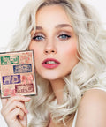 Vintage Date Clear Stamps Top Shelf Seal Set with various retro date stamps displayed by a model.