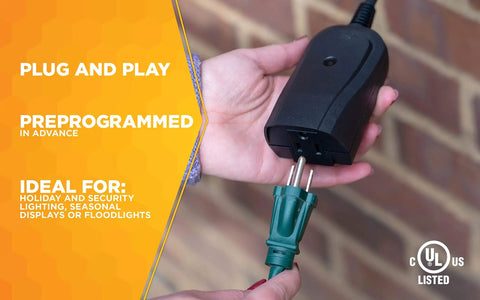 Weatherproof Outdoor Outlet Switch With Wireless Remote Controller held near brick wall