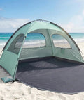 Mint Green Beach Tent With Anti UV Sun Shade Portable 3 Person Shelter on sandy beach
