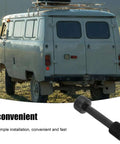 Vintage van in a field with close-up of hydraulic knockout set rod lock cap; ideal for fast hole punching of metal sheets and conduits.