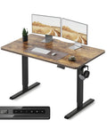 Electric Height Adjustable Standing Desk 48 By 24 Inches Sit Stand Computer Desk For Home Office Rustic Brown With Quiet Motor Under 50 dB Smooth Lifting From About 28 To 45 Inches Stable Steel Frame Ideal For Tall And Short Users, shown with dual monitors and headphones hanging on the side.
