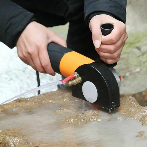 Person using Heavy Duty Angle Grinder Shield Set With Water Pump Compatibility, Dust Free Wet Cutting Guard on stone surface