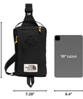 Berkeley Field Bag Water Repellent Finish vintage style travel sling next to 10" tablet for size comparison.