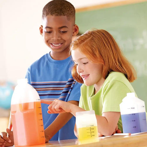 Children using Gallon Measurement Set for Kids and Classrooms; includes cups, pints, quarts, gallons; vibrant liquid colors.