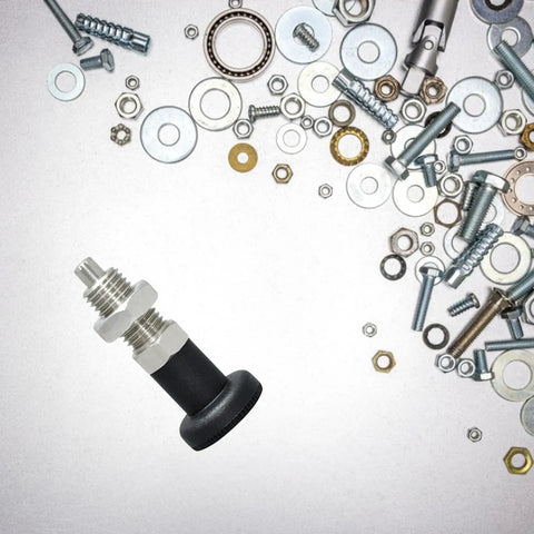 Slick Stainless Steel Locking Indexing Pin With Spring Loaded Knurled Knob on a background of screws and washers.