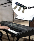 3 Pedal Board For Digital Pianos With Non Slip Lightweight Replacement Sustain Pedal, shown in use with a digital keyboard.