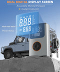 Portable Tire Inflator Air Compressor with 150 PSI and LCD Dual Screen beside off-road vehicle on rock