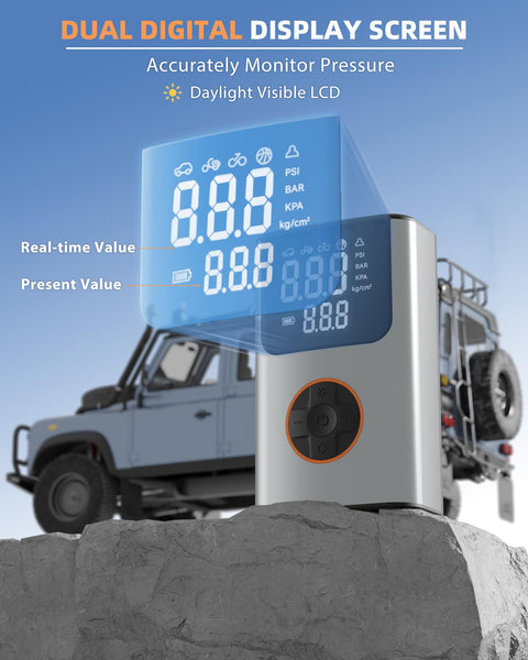 Portable Tire Inflator Air Compressor with 150 PSI and LCD Dual Screen beside off-road vehicle on rock