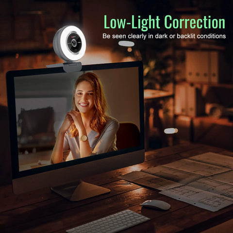 Flawless 1080p USB Webcam Featuring Built In Noise Reducing Mic And Tri Color Adjustable Ring Light on a computer for low-light video streaming.